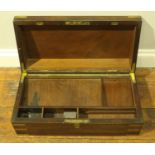 A 19th century brass bound mahogany writing slope, the hinged top with engraved brass plaque reading