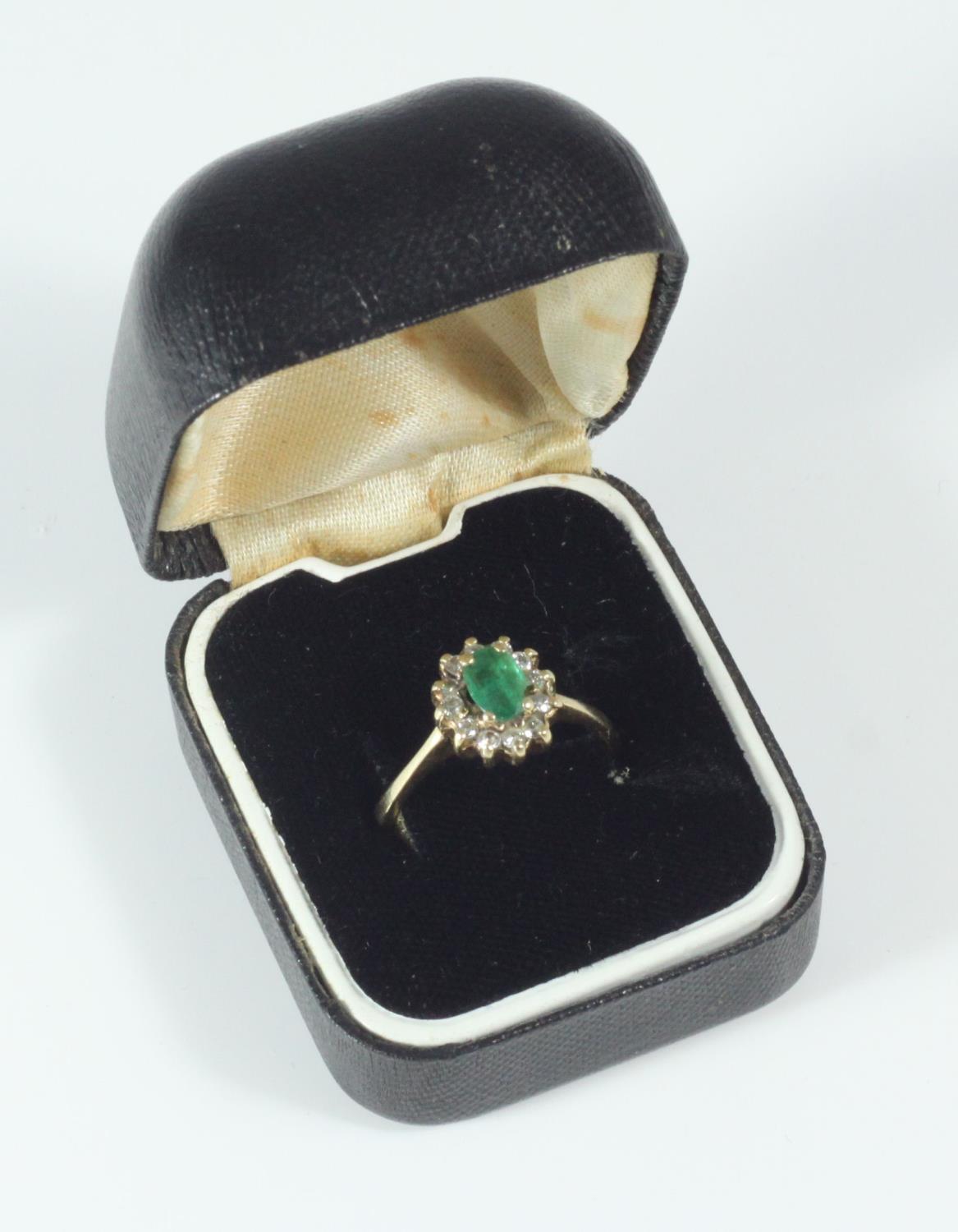 A 14K gold, emerald and diamond cluster ring, 2.77grams - Image 2 of 3