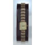 A ladies 9ct gold Rotary cocktail watch, the rectangular champagne dial with batons denoting