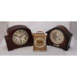 Three various clocks including a Junghans Electronic carriage clock and a Bentima mantel clock etc.