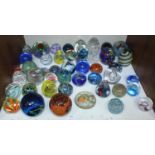 SECTION 10. A collection of forty-five glass paperweights including Mdina, Kosta and Caithness