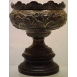 An early twentieth century Indian native silver rose bowl, with repousse domestic scenes and