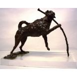 A late twentieth century bronze by Clare Tupman of a lively Jack Russell holding a branch in its