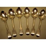 A set of six Regency silver fiddle pattern dessert spoons, engraved a star crest above initials,