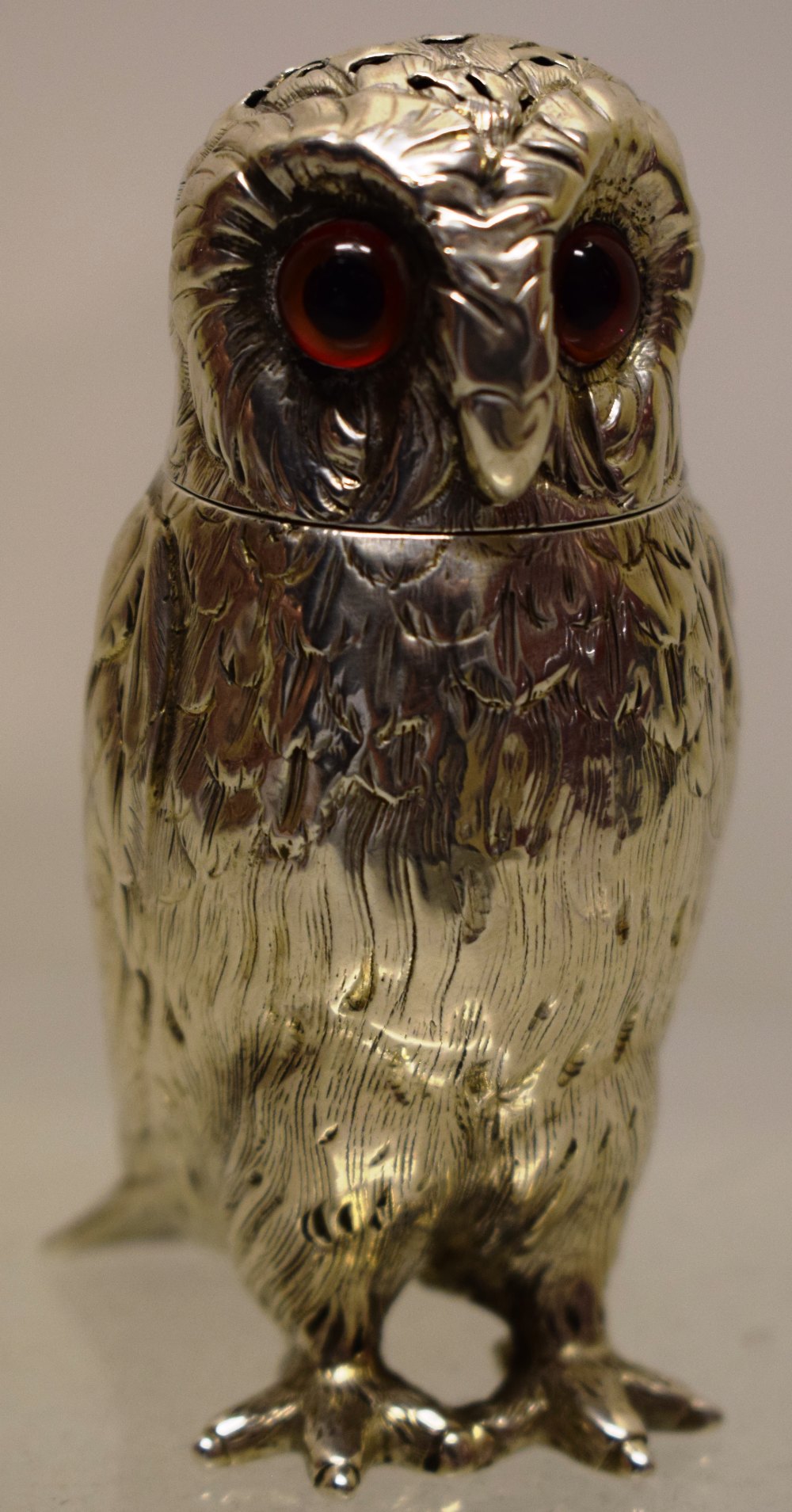 A Victorian silver novelty owl caster, with red glass eyes, gilded inside, 3.5in (9cm) Makers mark