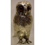 A Victorian silver novelty owl caster, with red glass eyes, gilded inside, 3.5in (9cm) Makers mark