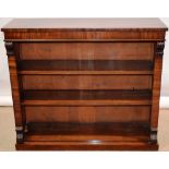 A Victorian mahogany veneered dwarf open bookcase, with two adjustable shelves, the side pilasters