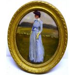 G Fidler. An unsigned oil painting on an oval wood panel, Edwardian lady in a pale blue dress