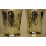 A pair of Victorian silver beakers, engraved with the arms of St Johns College Cambridge, on a