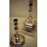 A pair of eighteenth century Swiss cast silver candlesticks, tongue moulded panelled Silesian