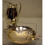 An Art Deco silver shallow dish, with moulded sides and two side handles, 6in (15cm across) Maker