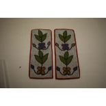 Pair of beaded flower panels, probably second half 19th century, each 11in. X 4 3/4in. 28cm. X 12cm.