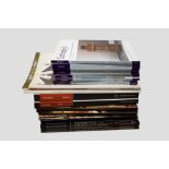 Two boxes of catalogues variously relating to Carpets, rugs and textiles and Fine Art and Furniture;