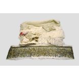 Collection of lace and various textiles including a Turkish towel end fragment, natural cotton