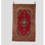 Kashan rug, west Persia, mid-20th century, 5ft. 6in. X 3ft. 5in. 1.68m. X 1.04m. Overall small areas