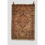 Saruk rug, north west Persia, circa 1930s, 4ft. 10in. X 3ft. 3in. 1.47m. X 1m. Small holes to field;