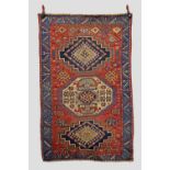 Triple-medallion Kazak rug, south west Caucasus, late 19th/early 20th century, 6ft. 8in. X 4ft. 3in.