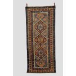 Caucasian long rug, possibly Kuba or Shirvan, late 19th/early 20th century, 8ft. 6in. X 3ft. 8in.