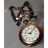 A French late nineteenth century lady's gold fob watch, with a brooch pendant fixing, a cream enamel