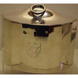 A George III silver elliptical tea caddy, with fluted panels to the sides, engraved a coat of arms