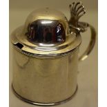 A small George III Newcastle silver circular mustard pot, the domed hinged cover with a pierced