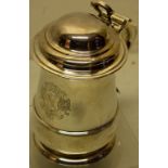 A George II silver quart baluster tankard, engraved a contemporary coat of arms, above a girdle