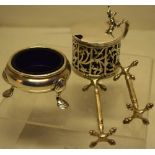 A late Victorian silver circular mustard pot, with pierced fretwork sides, the hinged lid with a