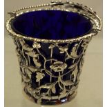 A George III silver cream pail, the wirework sides applied ribbon tied trailing foliage, a gadroon