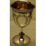 A Victorian Scottish silver wine goblet, the bell shape bowl engraved foliage swags, with a vacant