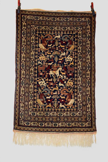 Mauri pictorial 'war' rug, Afghanistan, circa 1980s, 4ft. 11in. x 3ft. 2in. 1.50m. x 0.97m. Blue