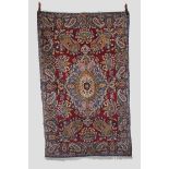 Kerman rug, south east Persia, circa 1930s-40s 7ft. 4in. x 4ft. 4in. 2.24m. x 1.32m. Small area of