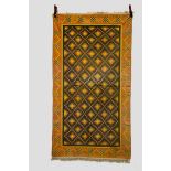 Indian dhurrie, second half 20th century, 6ft. 10in. x 3ft. 10in. 2.08m. x 1.17m. Olive green