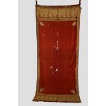 Indian red wool shawl, 19th century, 115in. x 50in. 293cm. x 127cm. The fine red wool centre
