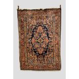 Mahal rug, north west Persia, mid-20th century, 7ft. 2in. x 5ft. 2.18m. x 1.52m. Dark blue field