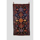 Hamadan rug, north west Persia, mid-20th century, 6ft. 6in. x 3ft. 5in. 1.98m. x 1.04m. Slight