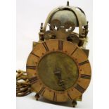 An Eighteenth century provincial brass lantern clock, the 8 day movement with a bell to the top, the
