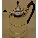 A George III silver coffee Bigin, the cylindrical body with reeded rings, having a scroll spout, the