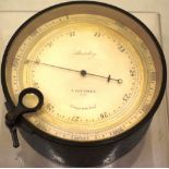 A late Victorian travelling special surveying or mining aneroid barometer, the circular silvered