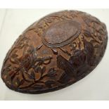 An unusual French prisoner of war carved Napoleonic coconut shell, decorated a shamrock and trophies