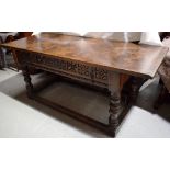 A Hispanic walnut refectory table, possibly Seventeenth century, the rectangular one piece top above