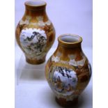 A pair of Japanese late nineteenth century Kutani porcelain vases, the bulbous ovoid bodies, with