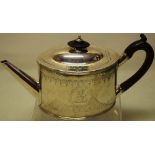 A George III silver oval teapot, of good guage, pendant engraved borders, the oval cartouches with