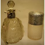 A late Victorian cut glass smelling salts bottle, decorated in hammered effect, the hatched hinged