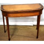 A Sheraton 'D' shape card table, veneered in satinwood, the fold over flap top cross banded in