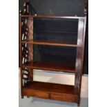 A late nineteenth century set of mahogany open wall shelves in Chinese Chippendale style, with