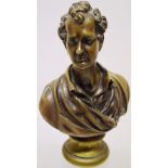 A bronze early nineteenth century portrait bust of Lord Byron, looking to sinister the socle,