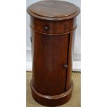 A Victorian mahogany veneered pillar box pot cupboard, with a frieze drawer, above the interior