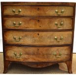 A small Sheraton faded mahogany veneered bow front chest of four long graduated drawers, with