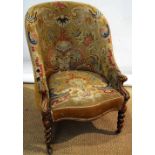 A Victorian tub shape occasional chair, covered in old floral needlework, the sprung seat to front