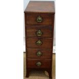 A Sheraton mahogany narrow bedside chest unit of five drawers, with brass locks and brass rondel